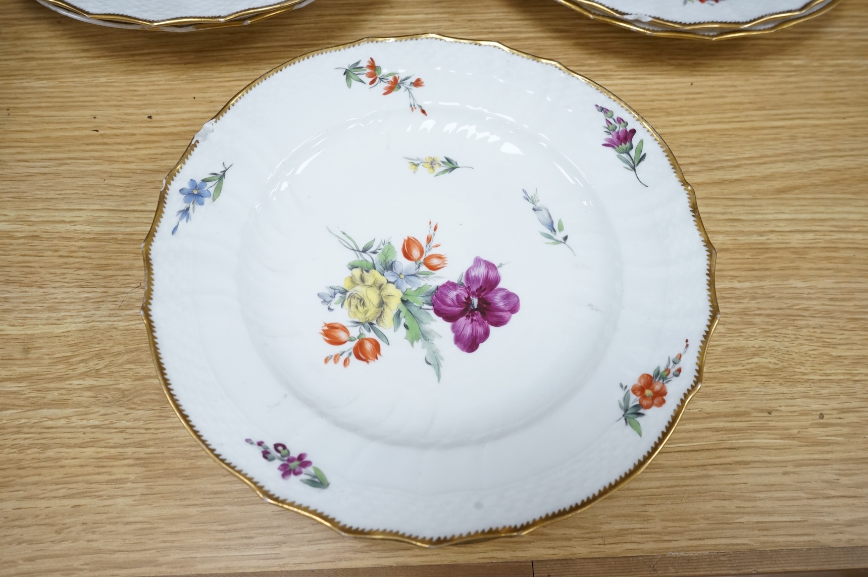 Ten 19th century Copenhagen floral porcelain plates, 23cm in diameter
